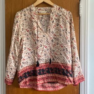 Masscob 100% silk blouse in red, navy, and tan floral print on ecru background.